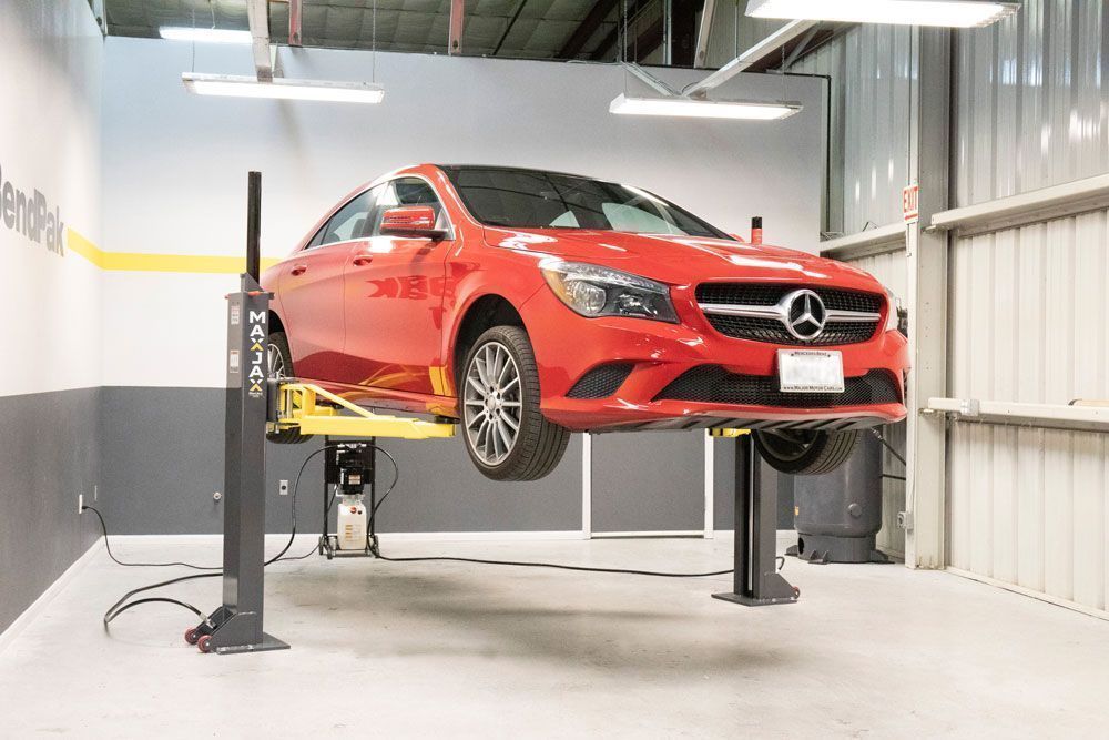 BendPak M7K portable two-post lift with Mercedes